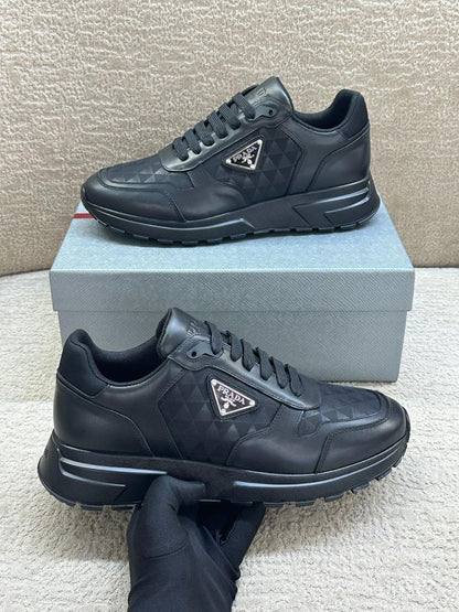 Prada Geometric-Pattern Panelled Sneakers (Black)